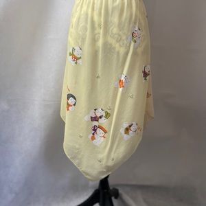 Handkerchief skirt in shades of yellow.